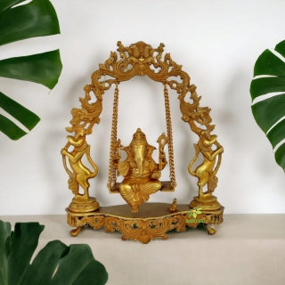 Ganesh Sitting On Carved Swing Having Yali Face Brass Statue Yellow